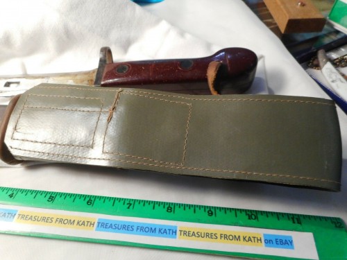 Romy green vinyl hanger 5.jpg